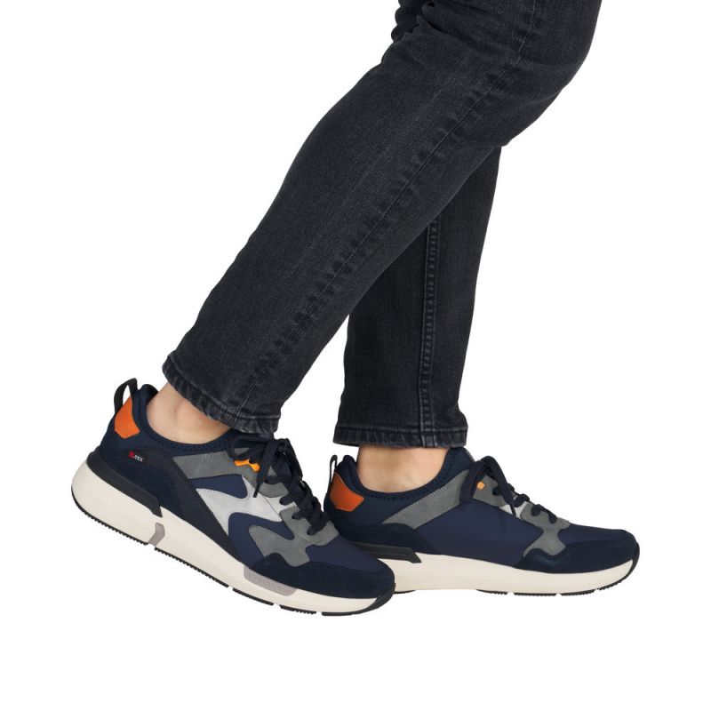 Basket noire, bleu, grise et blanche arrière orange Rieker