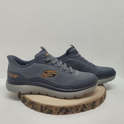 Basket grise mesh avec logo orange et lacet élastique Skechers