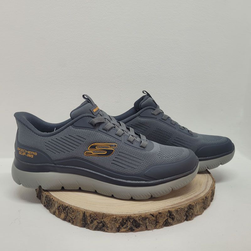 Basket grise mesh avec logo orange et lacet élastique Skechers