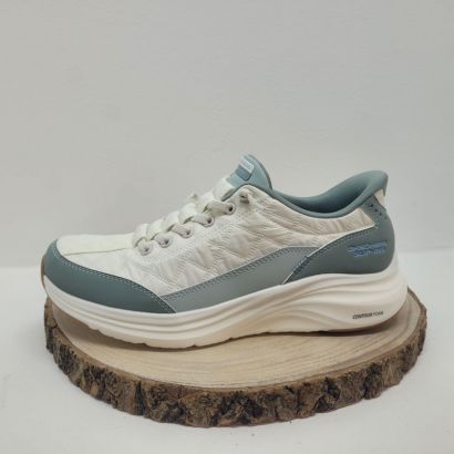 Basket sport blanche avec contour vert bleuté + lacet élastique Skechers