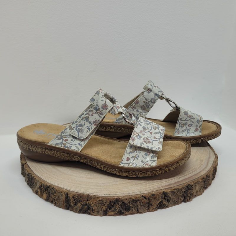 Mule plate imprimé fleurs avec deux velcros et un anneau Rieker