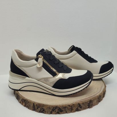 Basket beige et noire compensée semelle liseré noir remonte 