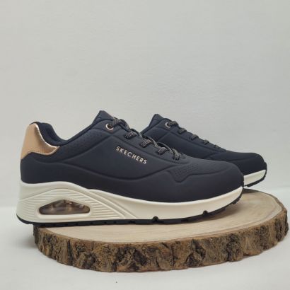 Basket noire compensée semelle blanche arrière bronze Skechers