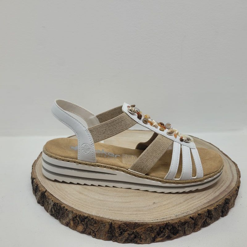 Nu-pied plat blanc avec coquillage sur la bride centrale Rieker