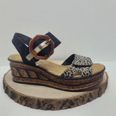 Nu-pieds compensé avec deux velcros noir et léopard et une boucle Rieker