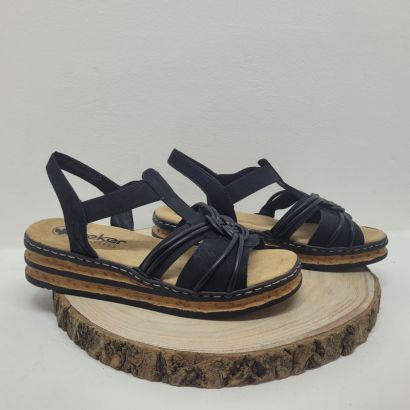 Nu pieds plate avec brides élastiques noir et motif sur l'avant Rieker