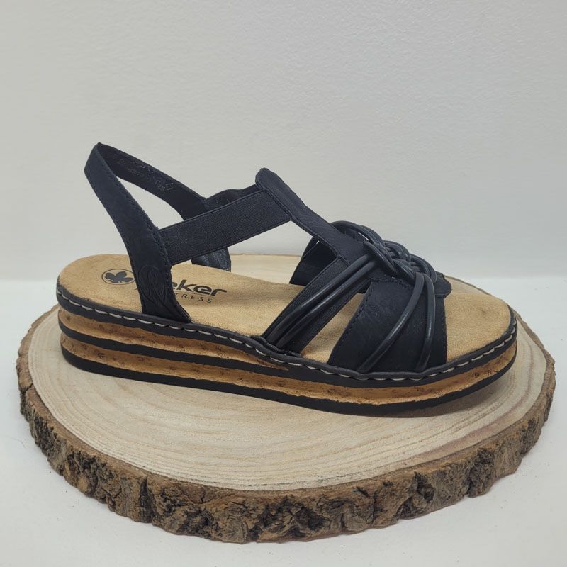 Nu pieds plate avec brides élastiques noir et motif sur l'avant Rieker