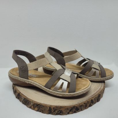 Nu-pied plat avec des brides élastiques taupe, beige et doré Rieker