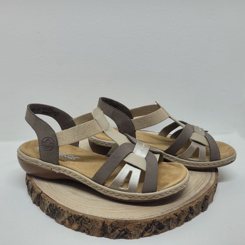 Nu-pied plat avec des brides élastiques taupe, beige et doré Rieker