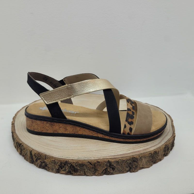 Mule compensé avec brides rose, argent, noir et motif léopard Rieker