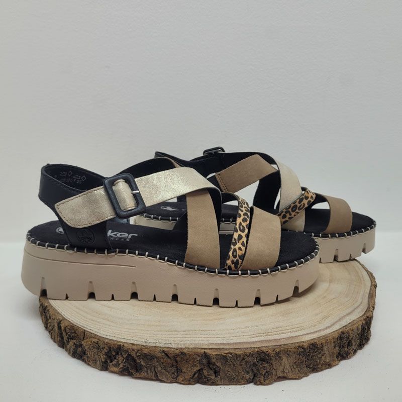 Nu-pied plat avec brides croisées noir / taupe/or Léopard Rieker