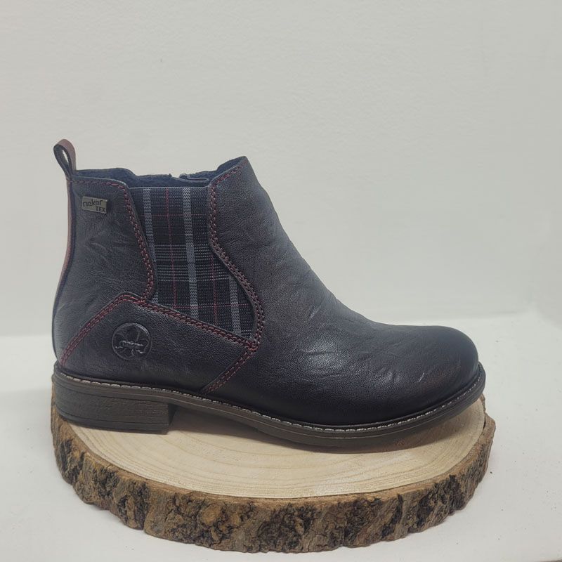 Bottine Noir plate avec zip et élastique fantaisie à carreaux sur le côté Rieker